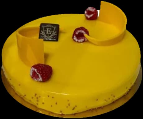 The Passionata, a round passion fruit entremet under a glossy yellow glaze