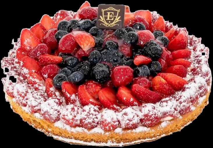 A By Eric summer fruit tart piled with strawberries, raspberries, blackberries and blueberries under a dusting of icing sugar